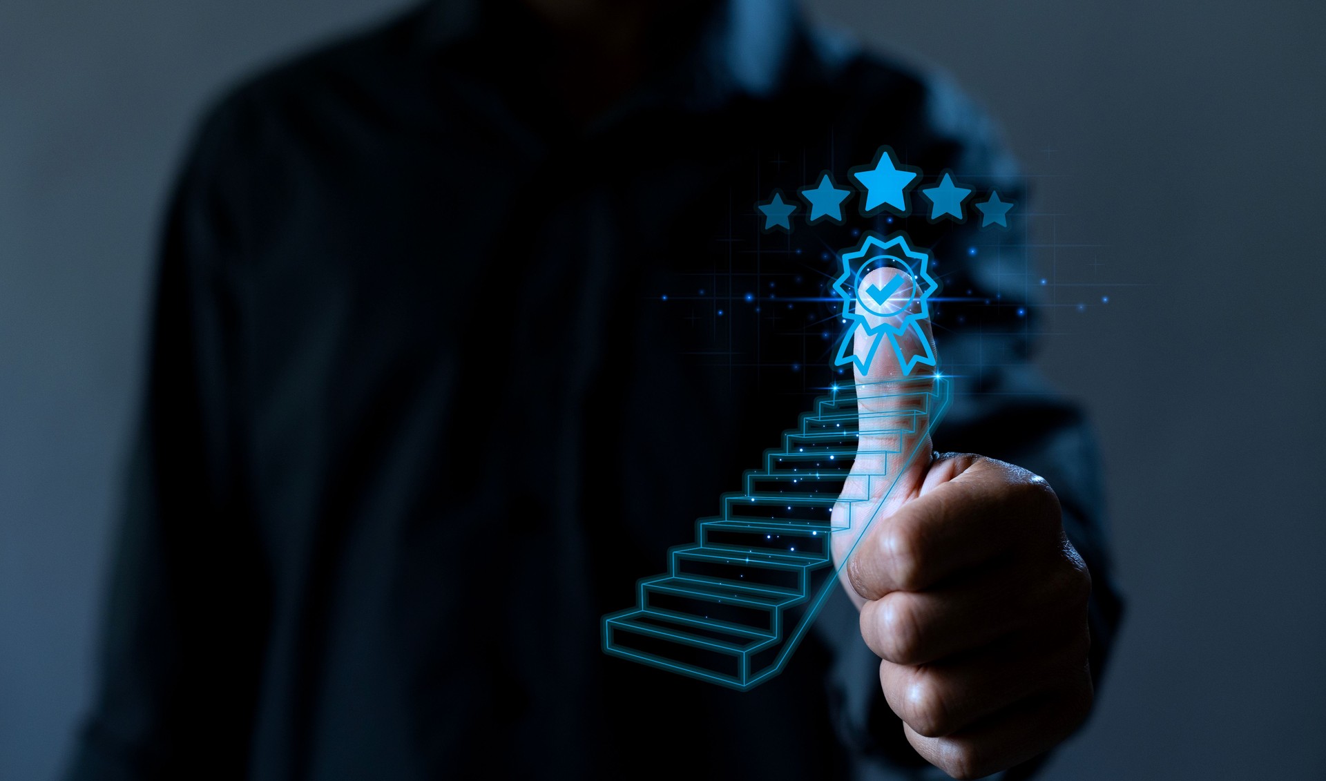 A business professional uses a digital interface to display success and achievement concepts, symbolized by stars and a staircase.